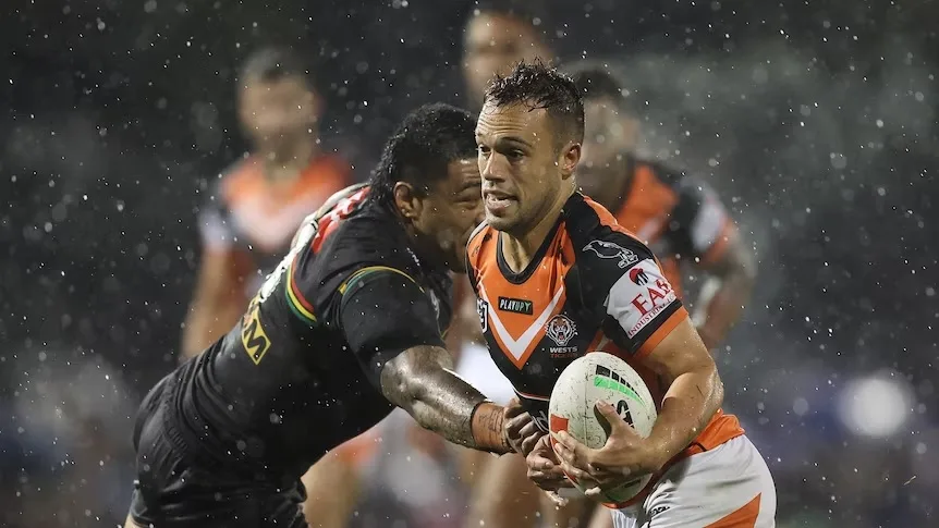 Wests Tigers Triumph In The Wet